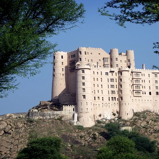 Hilltop fort rising above its rocky landscape at Alila Fort Bishangarh.
