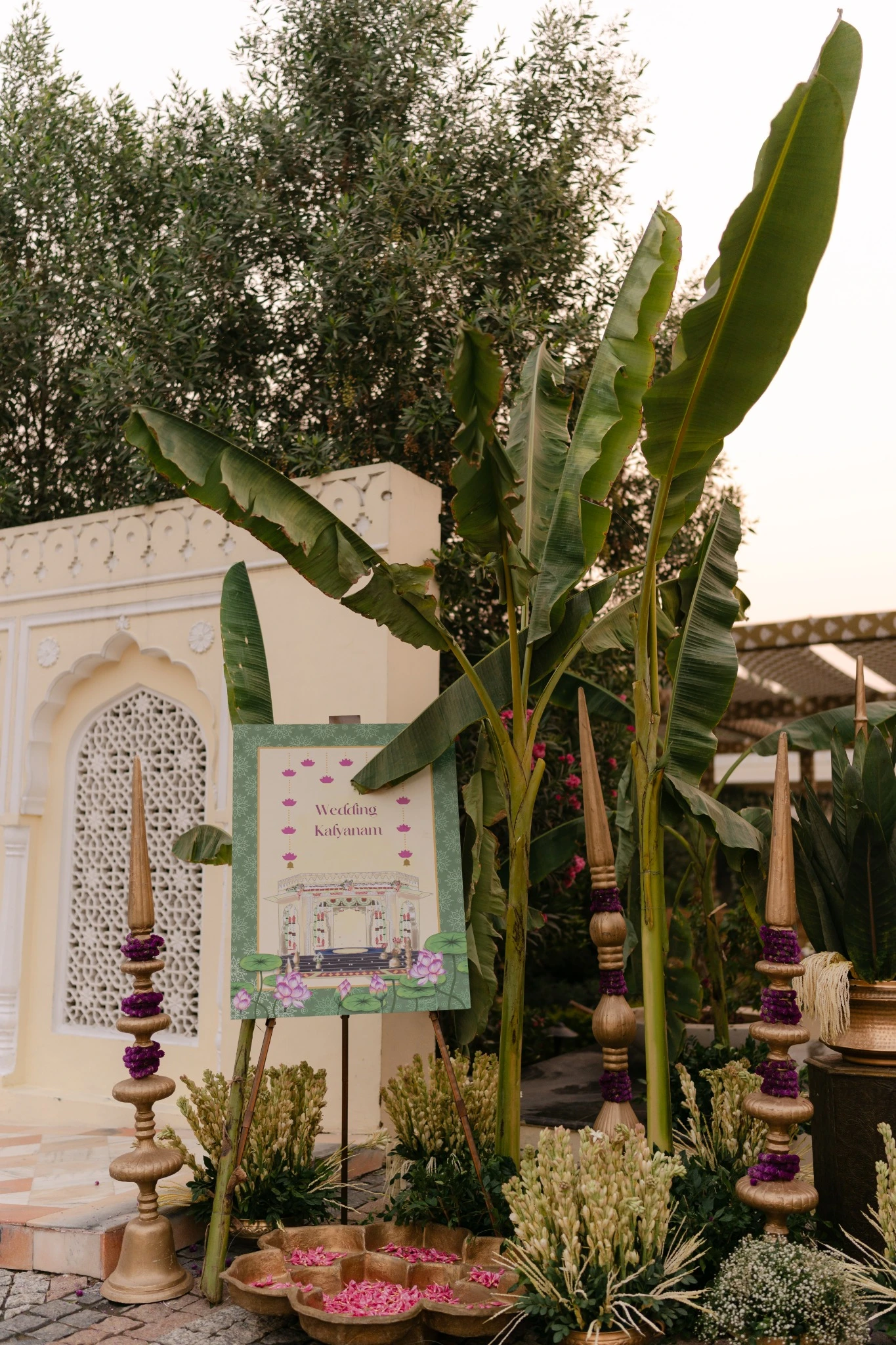 Banana plant and floral details beside the courtyard arch at Hyatt Regency Jaipur Mansarovar, Jaipur