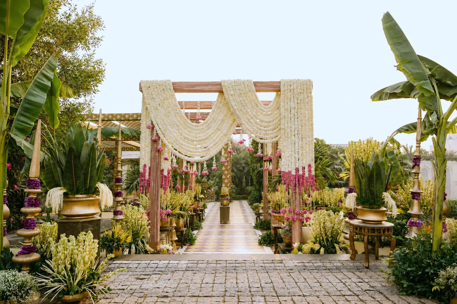 White garland canopy above the entrance path at Hyatt Regency Jaipur Mansarovar, Jaipur