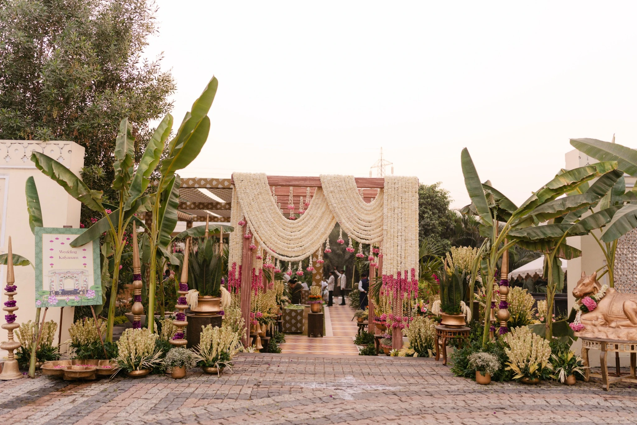 Wide view of the decorated wedding entrance at Hyatt Regency Jaipur Mansarovar, Jaipur