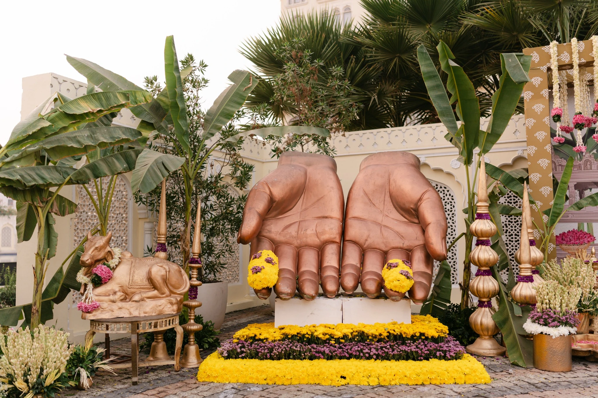 Goddess’s hand adorned with auspicious flowers at Hyatt Regency Jaipur Mansarovar, Jaipur