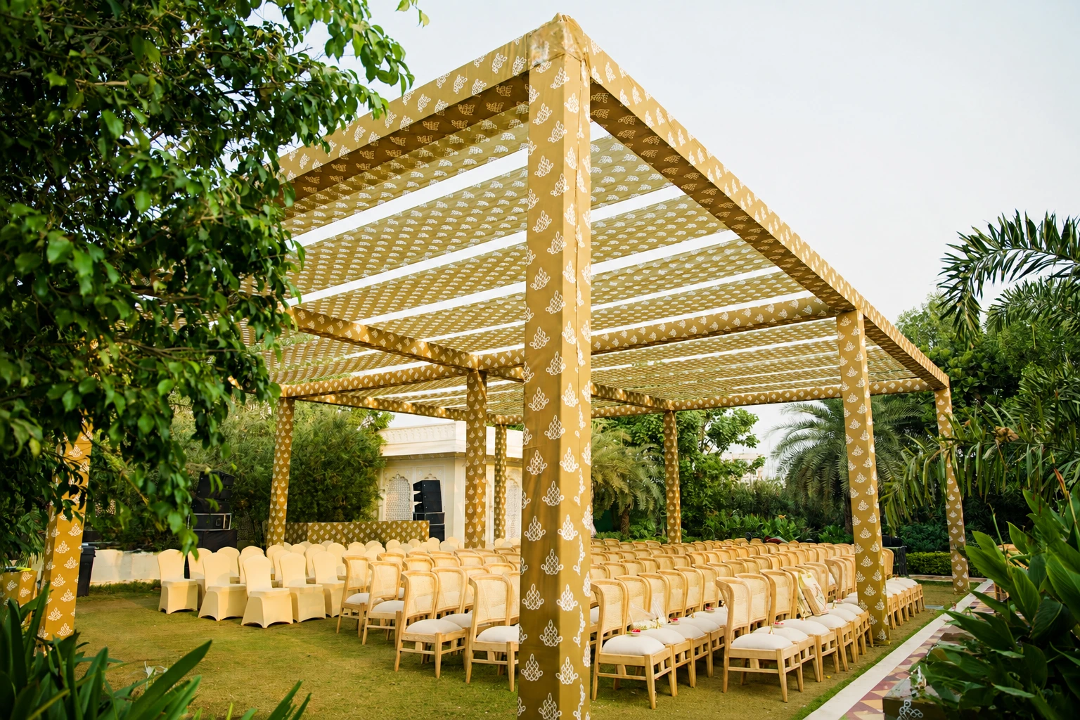 Canopy and wooden guest seating in the ceremony design at Hyatt Regency Jaipur Mansarovar, Jaipur