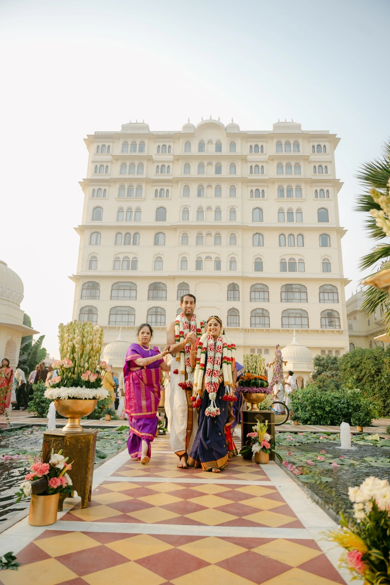 Ankita and Ajay with family in the Jaipur hotel courtyard at Hyatt Regency Jaipur Mansarovar, Jaipur
