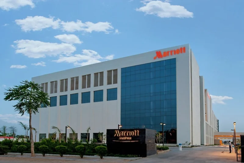 Daytime exterior and arrival driveway at Jaipur Marriott Hotel.